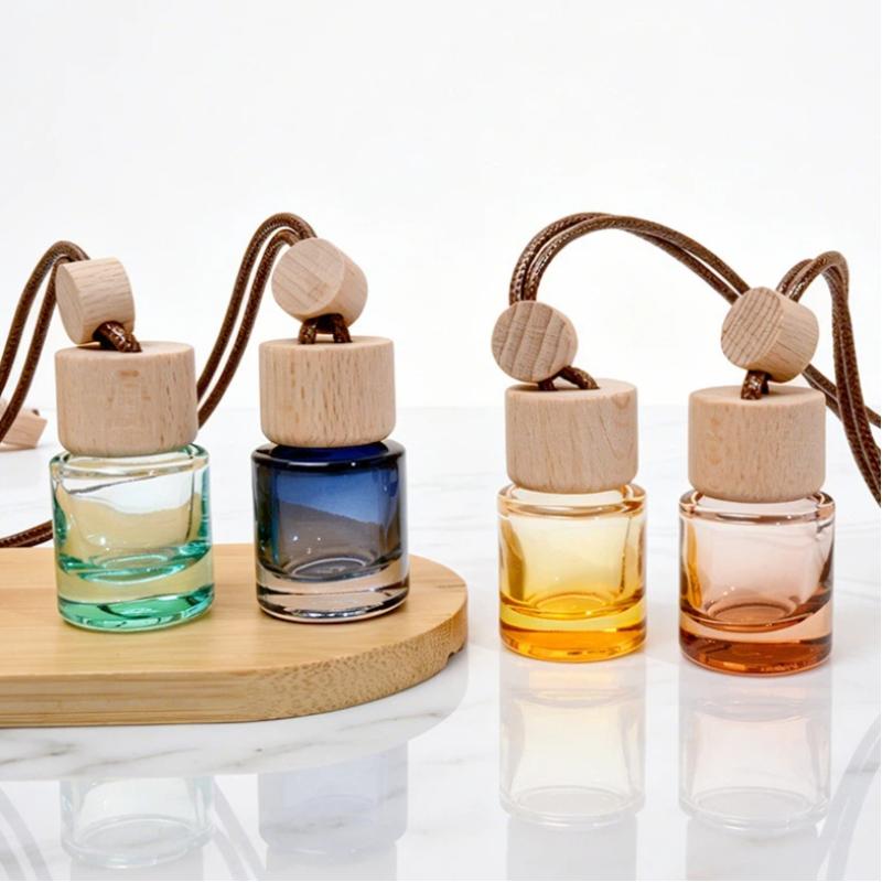 Car Air Freshener - Mini diffuseur d'huiles essentielles rond, flacon